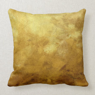 abstrakte Kunst gemalt im Hintergrund in Goldfarbe Kissen