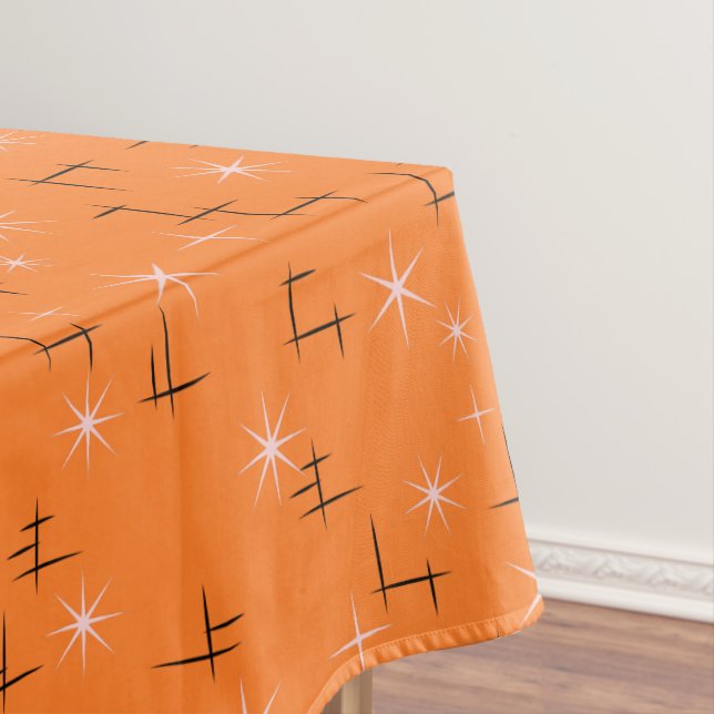 Abstrakte Linien und rosa Sterne auf orange Retro Tischdecke (Beispiel)