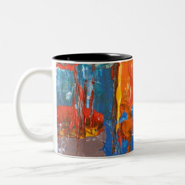 Abstrakte Malerei in Blau und Orange Zweifarbige Tasse (Links)