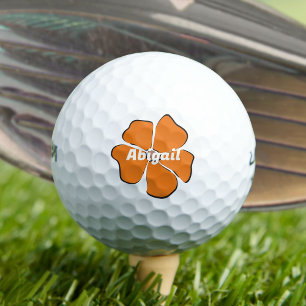 Abstrakte orange Gänseblümchen-Blume mit Ihrem Nam Golfball