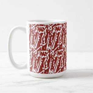 Abstrakte, rote und orange Formen mischen sich und Kaffeetasse