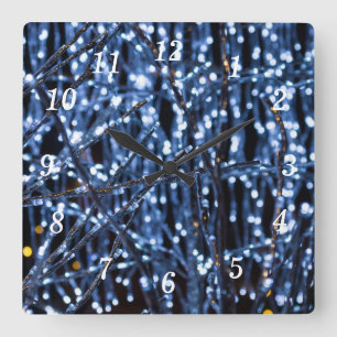 Abstrakte Uhr der blauen Lichter