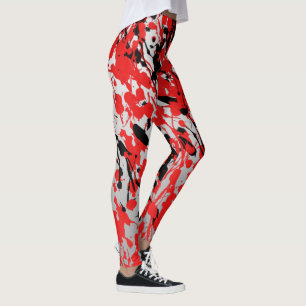 Abstrakter Splash und Tropfen in Schwarz und Rot Leggings