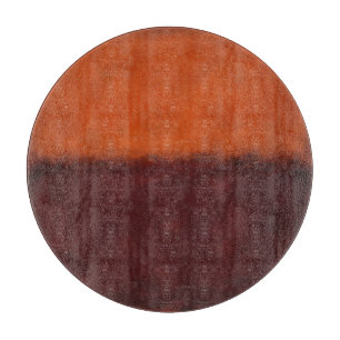 Abstrakter verbrannter orangefarbener Horizont Schneidebrett