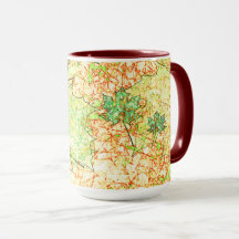 Abstraktes Acerblatt auf zerkratztem Boden, beige