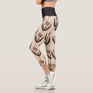 Abstraktes florales Blattgrün Schwarz Muster Capri Leggings