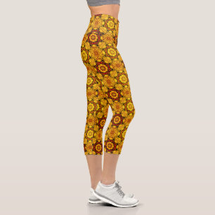 Abstraktes Gold- und Orangendesign Capri Leggings