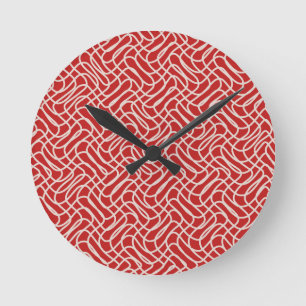 Abstraktes Muster in Rot und Creme Runde Wanduhr