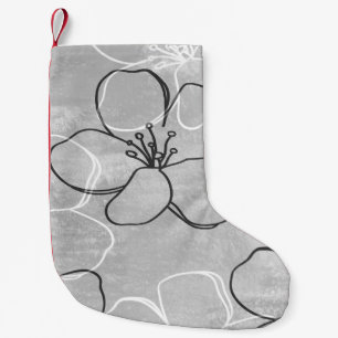 Abstraktes Ornament eines blühenden Apfelbaumes.Na Kleiner Weihnachtsstrumpf