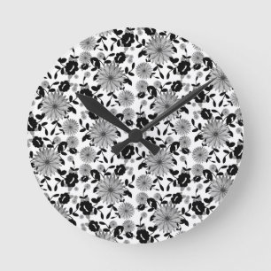 Abstraktes Schwarz-weißes Floraldesign Runde Wanduhr