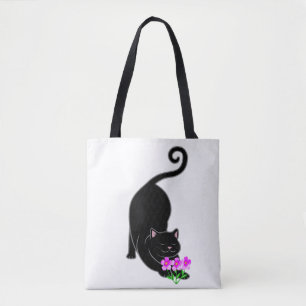 Abwärts gerichtete schwarze Kätzchenkatze und rosa