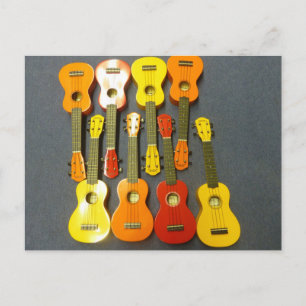 Acht rote orangefarbene gelbe Ukulelen Postkarte