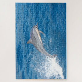 Action shot of dolphin spumping in Hawaii Puzzle