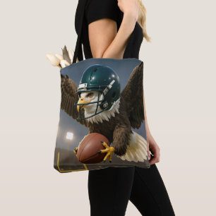 Adler mit einem Football in einem Sportstadion