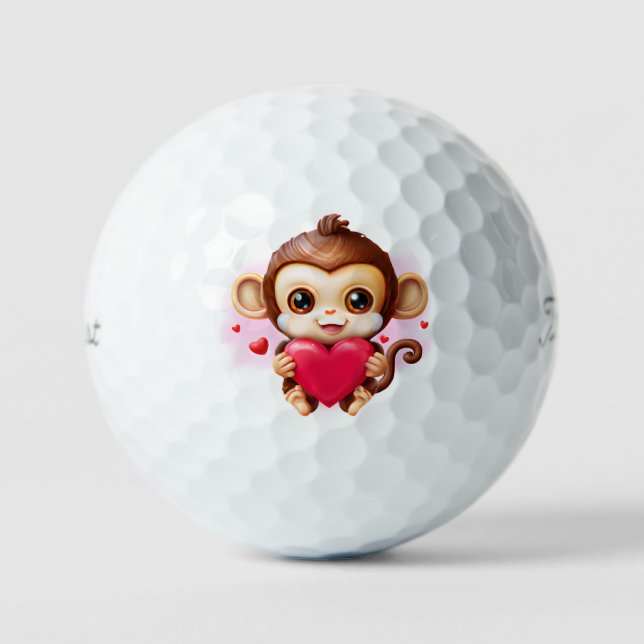 Adorable Baby Monkey hält ein rotes Herz Golfball (Vorderseite)