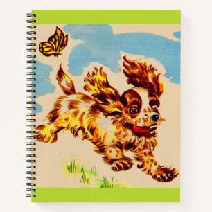 Adorable Cocker Spaniel Welpe auf dem Lauf Notizbuch