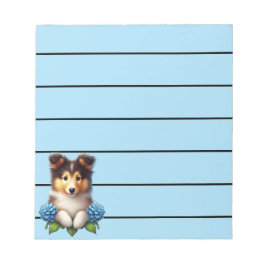 Adorable Collie Welpe mit blauen Blumen Notizblock