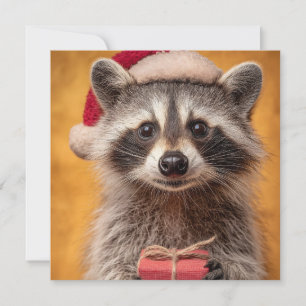 Adorable Raccoon in einer Weihnachtsmannmütze, die Feiertagskarte