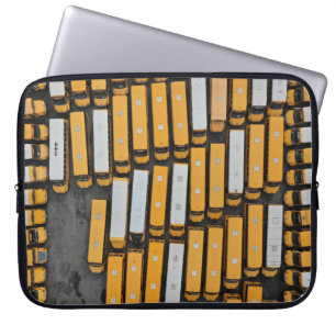 Aerial photography of white and yellow buses laptopschutzhülle