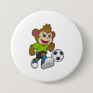 Affe als Fußballspieler mit Fußball Button