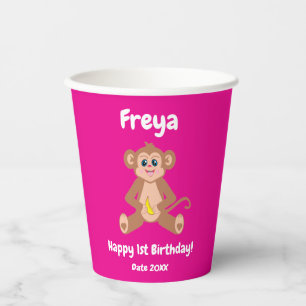 Affe auf rosa pappbecher