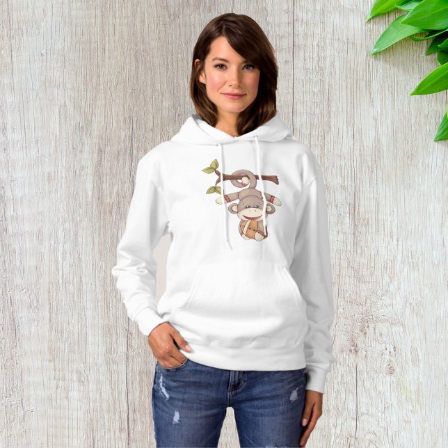 Affe, die einen Fußball hält Hoodie (Von Creator hochgeladen)