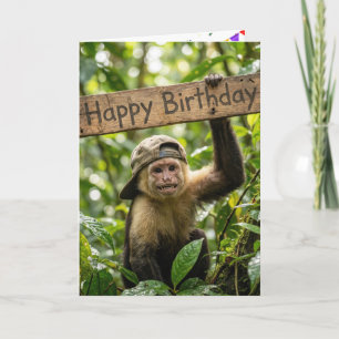 Affe hält ein Alles Gute zum Geburtstag-Schild Karte