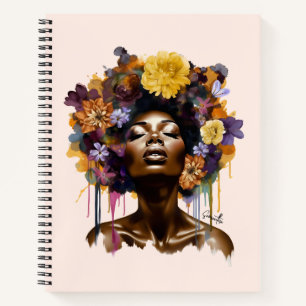 Afrikanisch-amerikanische Frau mit geblümtem Afro- Notizbuch