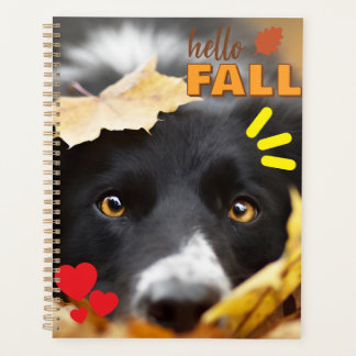 Agenda con imagen de perro entre hojas  planer