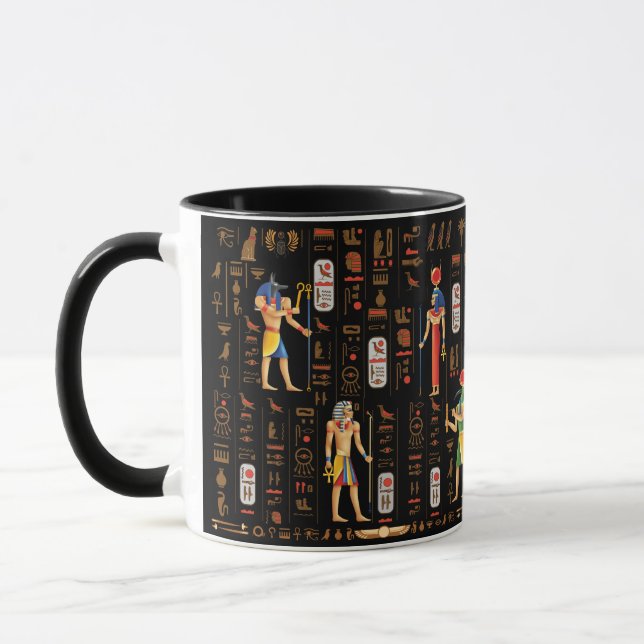 Ägyptische Hieroglyphen und Gottheiten aus Gold au Tasse (Links)
