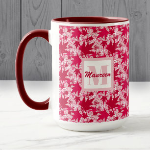 Ahorn-Blätter auf rosa Hintergrund Tasse