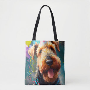 Airedale Hund mit Geburtstagshut und Ballons