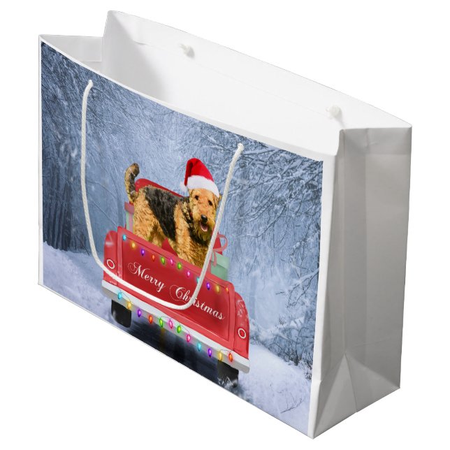 Airedale Terrier Dog in Snow sitzt zu Weihnachten Große Geschenktüte (Vorderseite Schrägansicht)