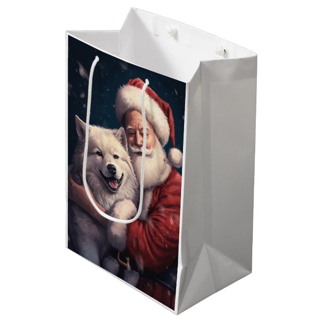 Akita mit dem Weihnachtsmann Weihnachten Mittlere Geschenktüte (Vorderseite Schrägansicht)