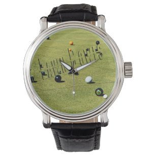 Aktion und Logo der Rasenbowls, Armbanduhr