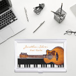 Akustische Gitarre Piano Schlüssel Musiklehrer Visitenkarten Dose<br><div class="desc">Erscheinen Sie beruflicher und behielt Sie Ihre Visitenkarten in unberührtem Zustand gleichzeitig mit diesem eleganten, modernen, schwarz-weiß Visitenkartengehäuse mit Gitarren- und Klaviertasten für diejenigen, deren Leidenschaft und/oder Beruf Musik ist. Ideal für Musiklehrer, Musiker oder alle Musikliebhaber. Sie können es anpassen und den Namen und den Beruf Ihres Liebsten schreiben, indem...</div>
