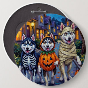 Alaskan Malamute Hunde beim Trick-or-Treat an Hall Button