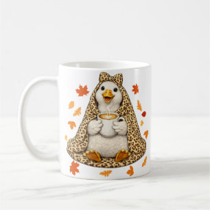 Alberne Gans in Leoparden-Decke mit Kaffee Kaffeetasse