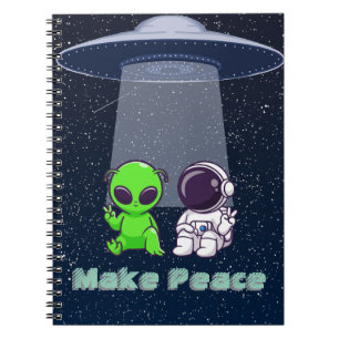 Alien & Earthling Peace auf einem Notebook Notizblock
