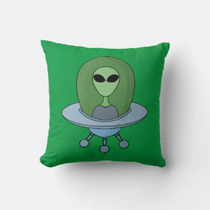 Alien in seinem kleinen Raumschiff Kissen