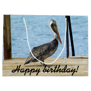 Alles Gute zum Geburtstag! Pelikan auf dem Große Geschenktüte