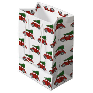 Alt modische Weihnachtsbaumwagen Familientradition Mittlere Geschenktüte