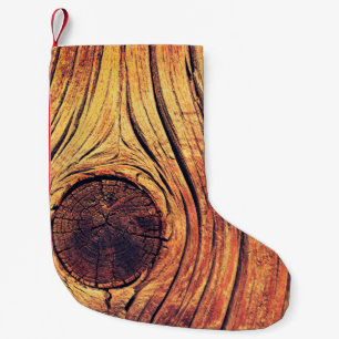 Alte Holzstruktur als Hintergrund. Vintage Farbsto Kleiner Weihnachtsstrumpf