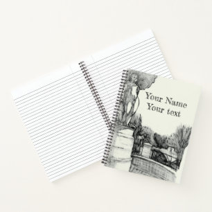 Alter Brunnen im Park mit Skulpturenjunge Notizbuch