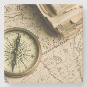 Alter Kompass über alter Karte Steinuntersetzer
