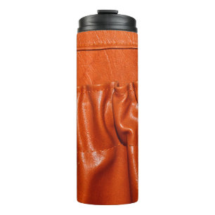 Altes Leder Vintage-Autositzdetail. blau, vergange Thermosbecher