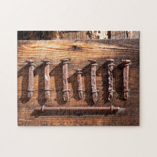 Altes Vintages rostiges Nagel-Puzzlespiel Puzzle
