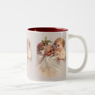Althergebrachter Weihnachtsmann und Cherub Zweifarbige Tasse