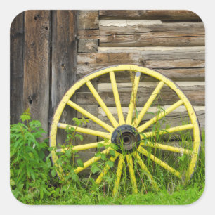 Altwagenrad in der historischen Altstadt von Gold Quadratischer Aufkleber