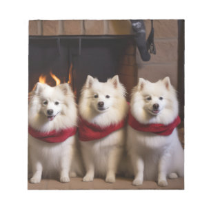 American Eskimo am Feuerplatz Weihnachten Notizblock